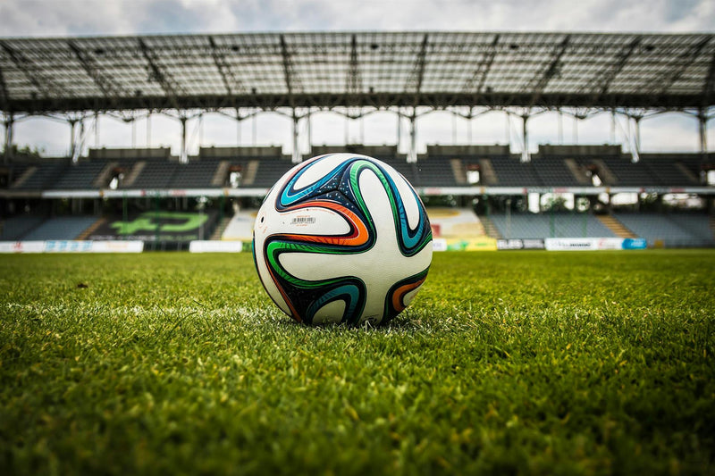 Football in the middle of stadium